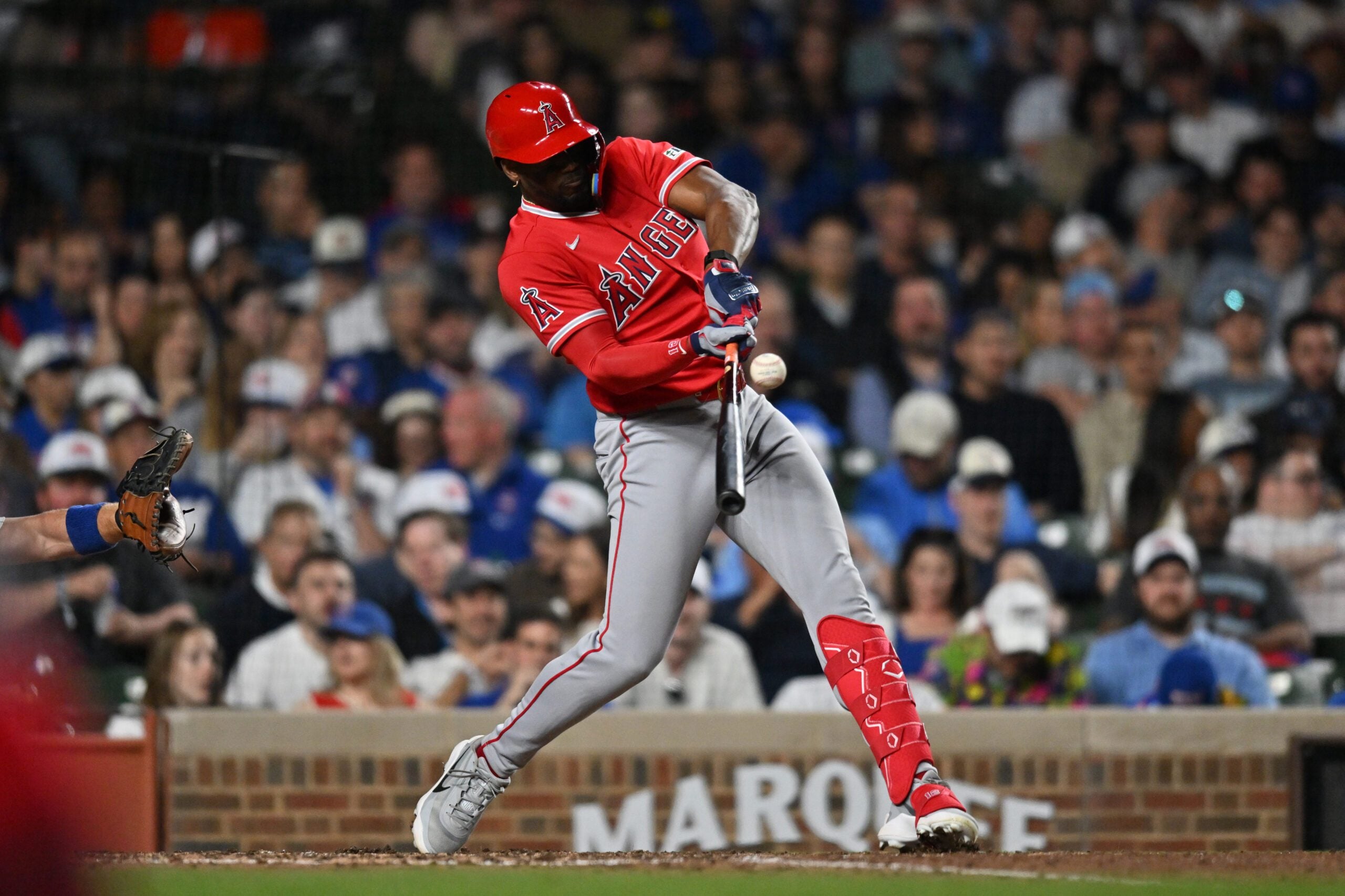 Mar 30, 2026; Chicago, Illinois, USA; Los Angeles Angels designated hitter Jorge Soler (12) singles against the Chicago Cubs during the seventh inning at Wrigley Field. Mandatory Credit: Patrick Gorski-Imagn Images