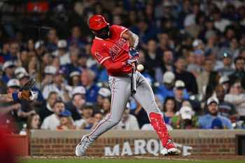 Mar 30, 2026; Chicago, Illinois, USA; Los Angeles Angels designated hitter Jorge Soler (12) singles against the Chicago Cubs during the seventh inning at Wrigley Field. Mandatory Credit: Patrick Gorski-Imagn Images