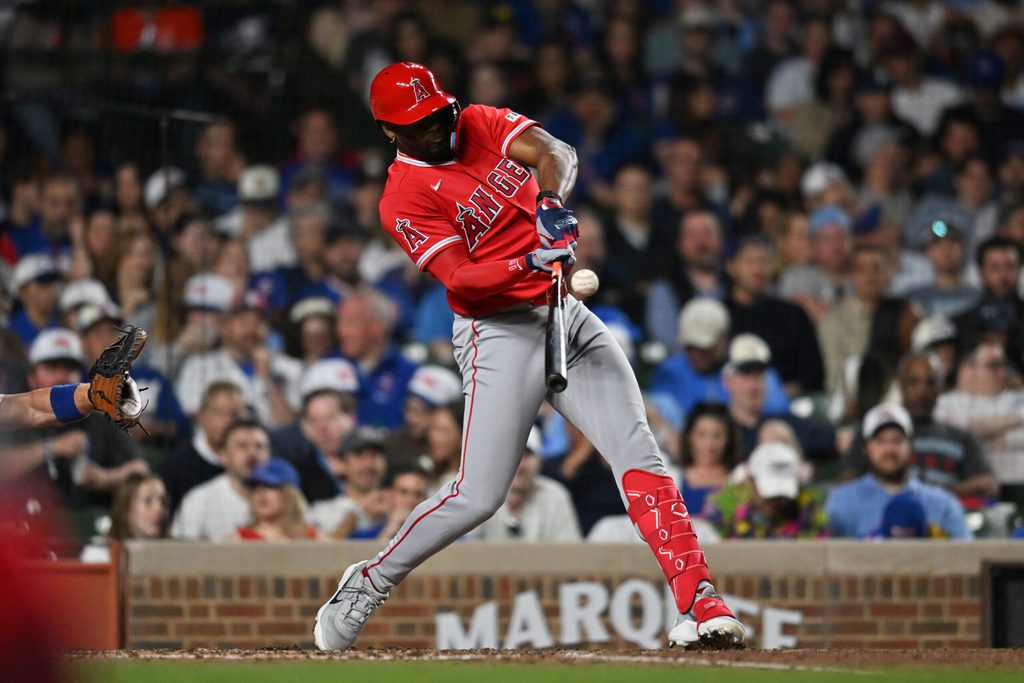 Mar 30, 2026; Chicago, Illinois, USA; Los Angeles Angels designated hitter Jorge Soler (12) singles against the Chicago Cubs during the seventh inning at Wrigley Field. Mandatory Credit: Patrick Gorski-Imagn Images