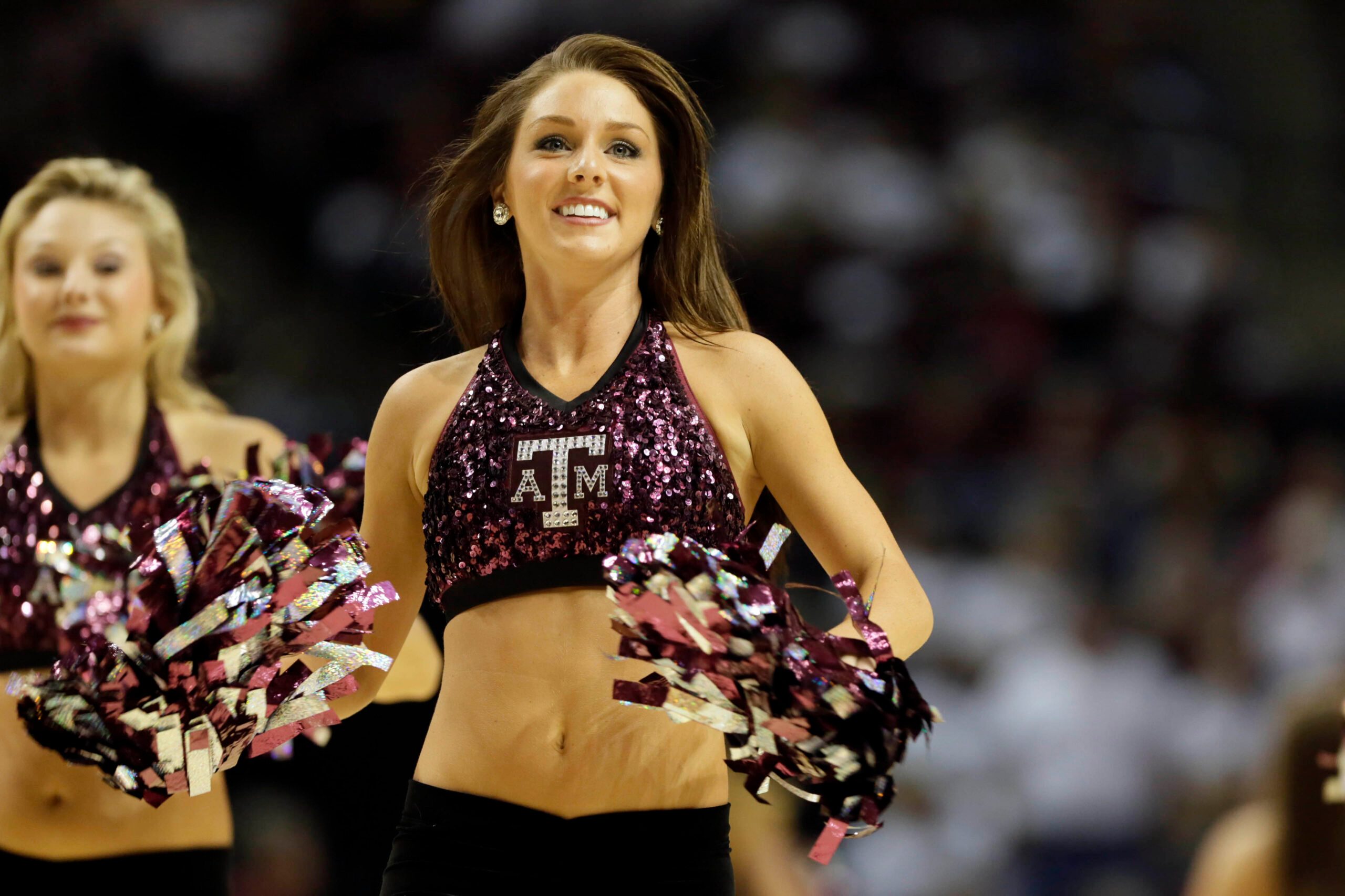 Nov 18, 2012; College Station, TX, USA; Texas A&M Aggies cheerleader performs during the second half against the Connecticut Huskies at the Reed Arena. The Huskies won 81-50. Mandatory Credit: Soobum Im-Imagn Images