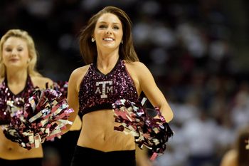 Nov 18, 2012; College Station, TX, USA; Texas A&M Aggies cheerleader performs during the second half against the Connecticut Huskies at the Reed Arena. The Huskies won 81-50. Mandatory Credit: Soobum Im-Imagn Images