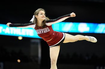 Mar 20, 2014; Spokane, WA, USA; Harvard Crimson cheerleader performs in the first half of a men's college basketball game during the second round of the 2014 NCAA Tournament against the Cincinnati Bearcats at Veterans Memorial Arena. Mandatory Credit: James Snook-Imagn Images