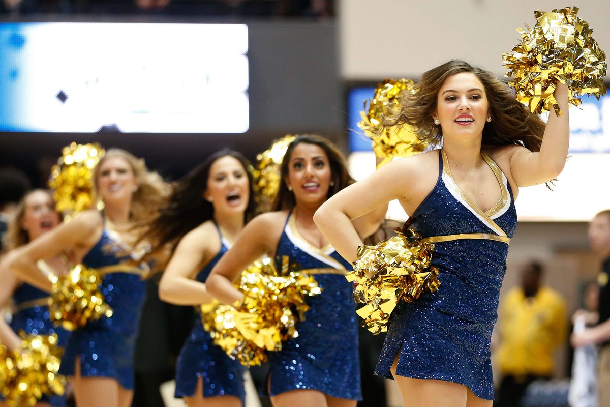 Feb 14, 2015; Washington, DC, USA; George Washington Colonials cheerleaders perform on the court during a stoppage in play against the Virginia Commonwealth Rams at Charles E. Smith Center. Mandatory Credit: Amber Searls-Imagn Images