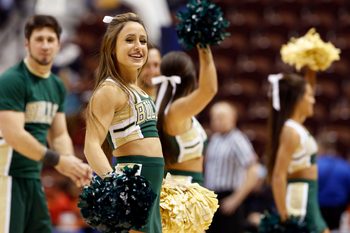 Mar 7, 2015; Uncasville, CT, USA; The South Florida Bulls cheerleaders perform during a break in the action against the Memphis Lady Tigers in the second half during the quarterfinal round of the American Conference Tournament at Mohegan Sun Arena. USF defeated Memphis 79-51. Mandatory Credit: David Butler II-Imagn Images