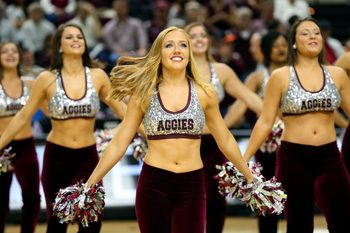 Feb 16, 2016; College Station, TX, USA; Texas A&M Aggies cheerleaders perform before a game against the Mississippi Rebels at Reed Arena. Mandatory Credit: Troy Taormina-Imagn Images