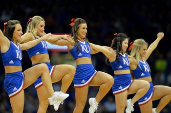 Nov 25, 2016; Lawrence, KS, USA; Kansas Jayhawks cheerleaders entertain fans during the second half against the North Carolina-Asheville Bulldogs  at Allen Fieldhouse. Kansas won 95-57. Mandatory Credit: Denny Medley-Imagn Images