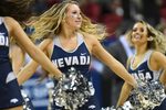 Mar 11, 2017; Las Vegas, NV, USA; Nevada Wolf Pack cheerleaders entertain the crowd during the Mountain West Conference Championship game between Nevada and the Colorado State Rams at Thomas and Mack Center. Mandatory Credit: Stephen R. Sylvanie-Imagn Images