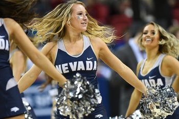 Mar 11, 2017; Las Vegas, NV, USA; Nevada Wolf Pack cheerleaders entertain the crowd during the Mountain West Conference Championship game between Nevada and the Colorado State Rams at Thomas and Mack Center. Mandatory Credit: Stephen R. Sylvanie-Imagn Images