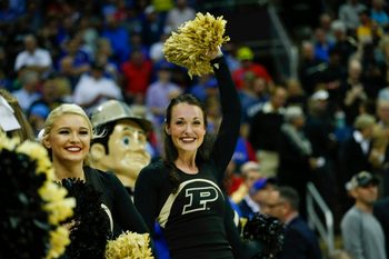 Mar 23, 2017; Kansas City, MO, USA; Purdue Boilermakers cheerleaders perform during the first half against the Kansas Jayhawks in the semifinals of the midwest Regional of the 2017 NCAA Tournament at Sprint Center. Mandatory Credit: Jay Biggerstaff-Imagn Images