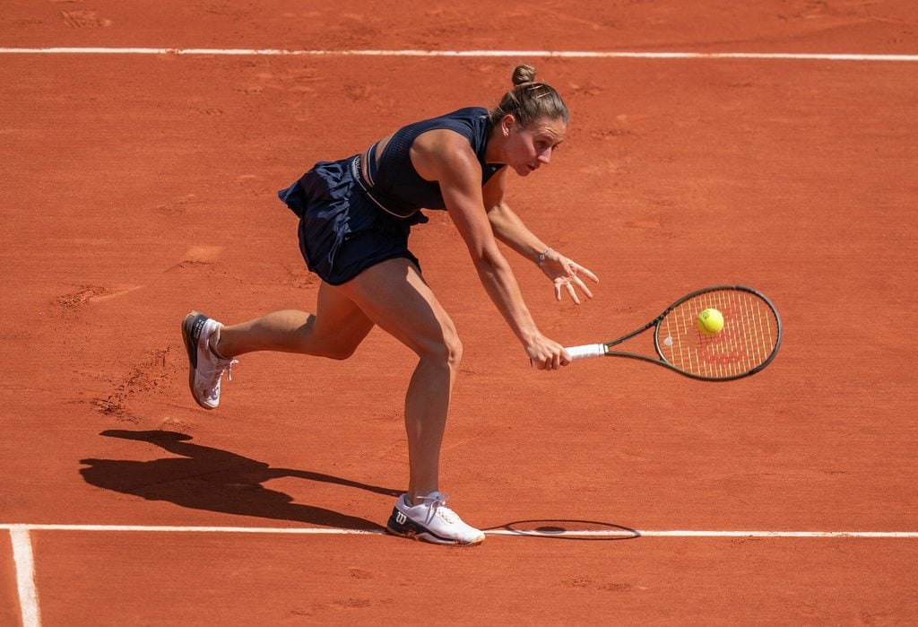 May 28, 2023; Paris, France; Marta Kostyuk (UKR) returns a shot in her first round match against Aryna Sabalenka on day one at Stade Roland-Garros. Mandatory Credit: Susan Mullane-Imagn Images