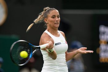 Jul 4, 2023; London, United Kingdom; Panna Udvardy (HUN) returns a shot during her match against Aryna Sabalenka on day two at the All England Lawn Tennis and Croquet Club.  Mandatory Credit: Susan Mullane-Imagn Images