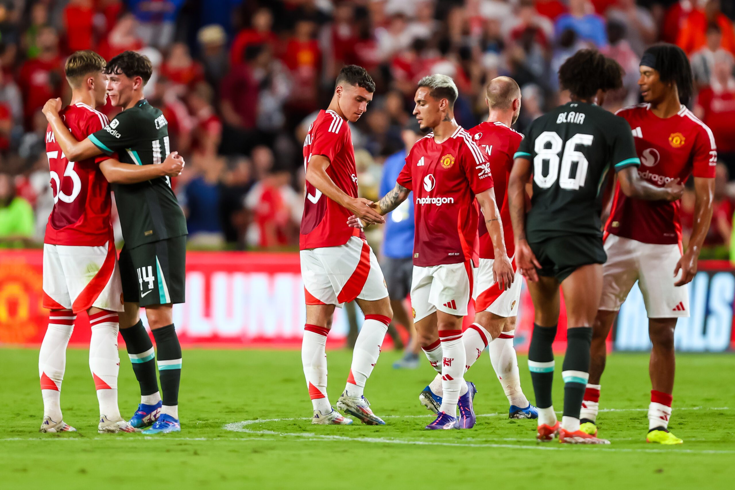 Aug 3, 2024; Columbia, South Carolina, USA;  Liverpool and Manchester United players shake hands following their match at Williams-Brice Stadium. Mandatory Credit: Jeff Blake-Imagn Images