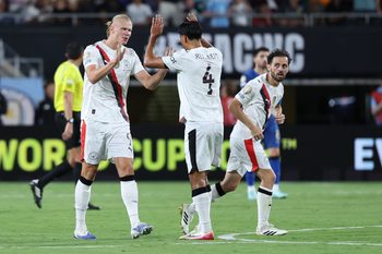Jun 30, 2025; Orlando, Florida, USA; Manchester City forward Erling Haaland (9) celebrates with midfielder Tijjani Reijnders (4) after scoring in the second half during a round of 16 match of the 2025 FIFA Club World Cup at Camping World Stadium. Mandatory Credit: Nathan Ray Seebeck-Imagn Images