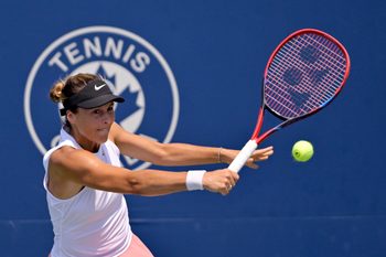 Jul 28, 2025; Montreal, QC, Canada; Tatjana Maria (GER) reacts returns the ball against Laura Siegemund (GER) in first round play at IGA Stadium. Mandatory Credit: Eric Bolte-Imagn Images