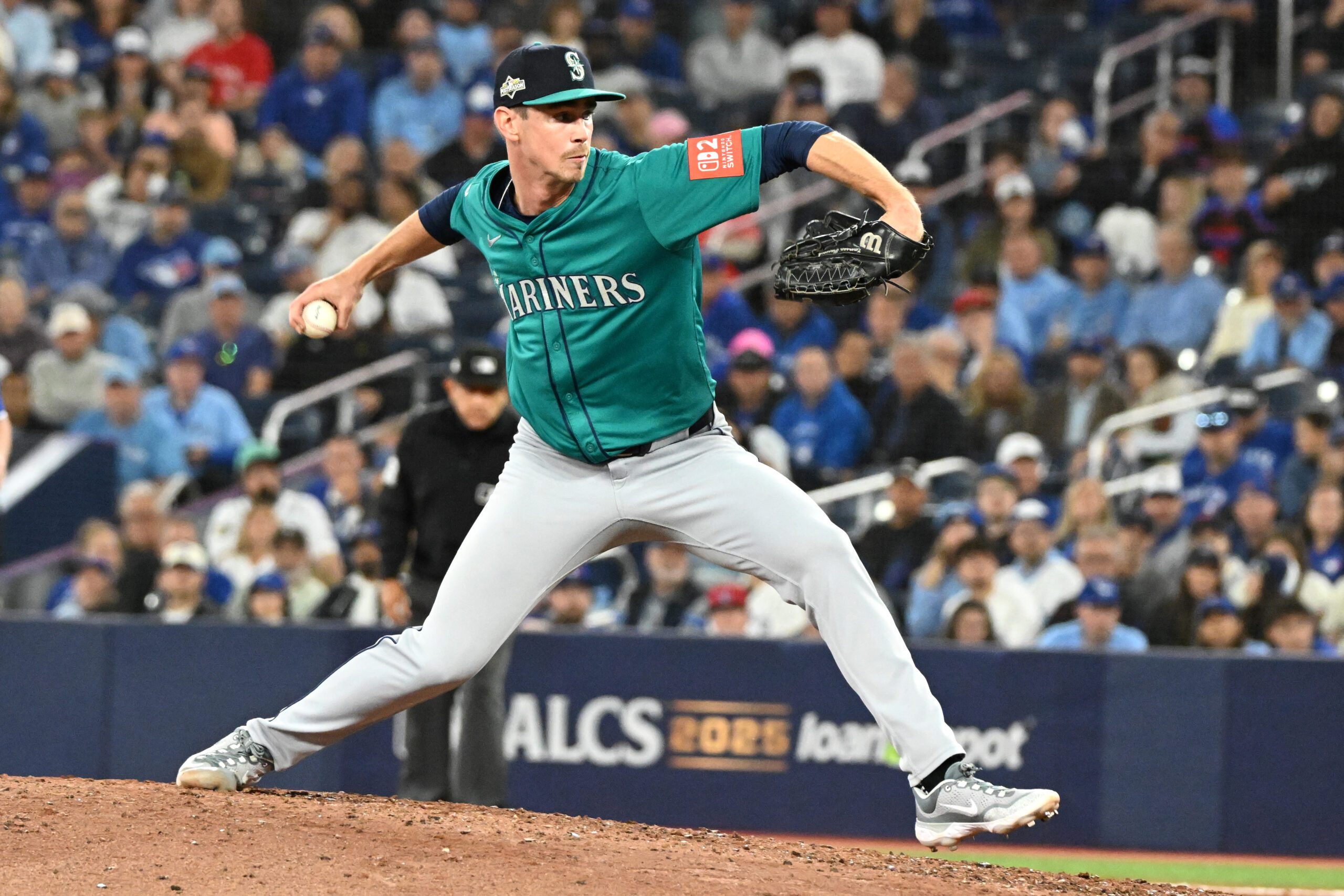 Oct 13, 2025; Toronto, Ontario, CAN; Seattle Mariners pitcher Emerson Hancock (26) pitches against the Toronto Blue Jays in the eighth inning during game two of the ALCS round for the 2025 MLB playoffs at Rogers Centre. Mandatory Credit: Dan Hamilton-Imagn Images