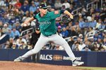 Oct 13, 2025; Toronto, Ontario, CAN; Seattle Mariners pitcher Emerson Hancock (26) pitches against the Toronto Blue Jays in the eighth inning during game two of the ALCS round for the 2025 MLB playoffs at Rogers Centre. Mandatory Credit: Dan Hamilton-Imagn Images
