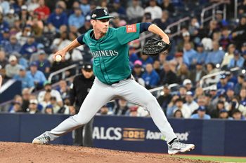 Oct 13, 2025; Toronto, Ontario, CAN; Seattle Mariners pitcher Emerson Hancock (26) pitches against the Toronto Blue Jays in the eighth inning during game two of the ALCS round for the 2025 MLB playoffs at Rogers Centre. Mandatory Credit: Dan Hamilton-Imagn Images