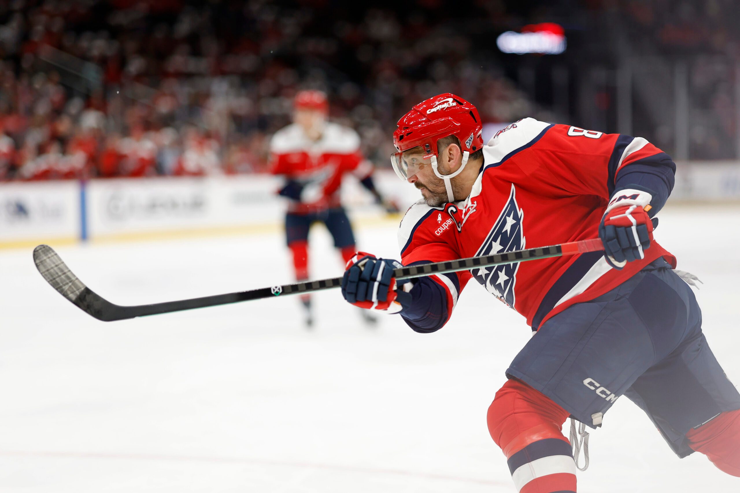 Dec 7, 2025; Washington, District of Columbia, USA; Washington Capitals left wing Alex Ovechkin (8) shoots the puck against the Columbus Blue Jackets during the third period at Capital One Arena. Mandatory Credit: Geoff Burke-Imagn Images