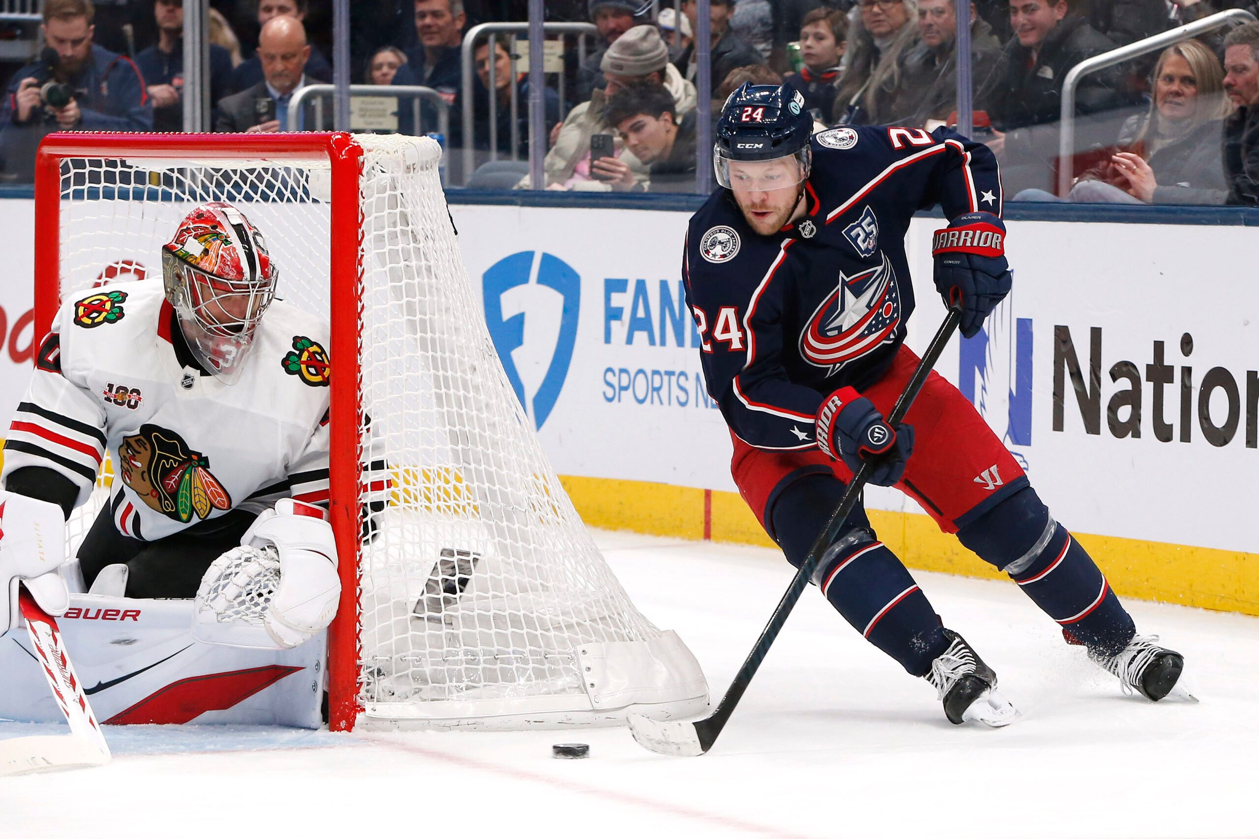 Feb 4, 2026; Columbus, Ohio, USA; Columbus Blue Jackets center Mathieu Olivier (24) carries the puck against the Chicago Blackhawks  during the second period at Nationwide Arena. Mandatory Credit: Russell LaBounty-Imagn Images