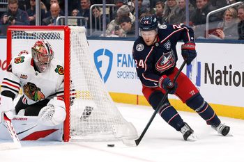 Feb 4, 2026; Columbus, Ohio, USA; Columbus Blue Jackets center Mathieu Olivier (24) carries the puck against the Chicago Blackhawks  during the second period at Nationwide Arena. Mandatory Credit: Russell LaBounty-Imagn Images