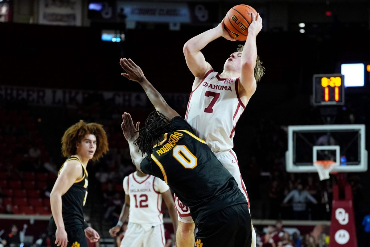 Oklahoma Sooners guard Dayton Forsythe (7) is fouled by Missouri Tigers guard Anthony Robinson II (0) as he shoots during an NCAA men's basketball game between the University of Oklahoma Sooners (OU) and the Missouri Tigers at Lloyd Noble Center in Norman, Okla., Tuesday, March 3, 2026. Oklahoma won 80-64.