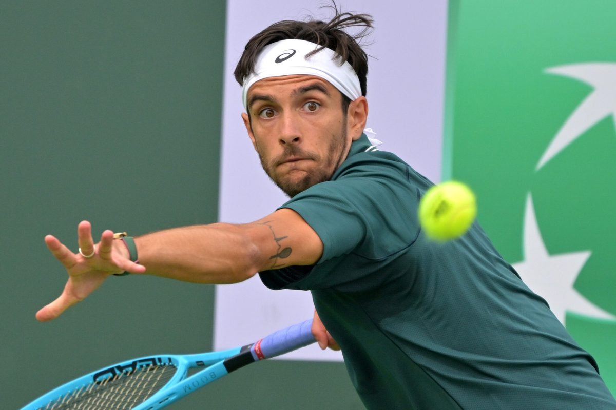 Mar 6, 2026; Indian Wells, CA, USA;  Lorenzo Musetti (ITA) hits a shot during his second round match against Marton Fucsovics (HUN) in the BNP Paribas Open at the Indian Wells Tennis Garden. Mandatory Credit: Jayne Kamin-Oncea-Imagn Images