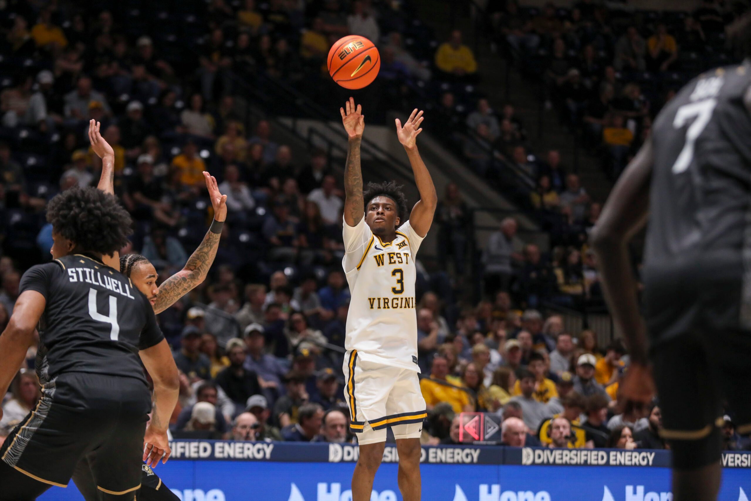 Mar 6, 2026; Morgantown, West Virginia, USA; West Virginia Mountaineers guard Honor Huff (3) shoots a three-point shot during the second half against the UCF Knights at Hope Coliseum. Mandatory Credit: Ben Queen-Imagn Images