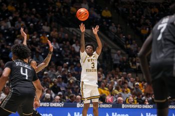 Mar 6, 2026; Morgantown, West Virginia, USA; West Virginia Mountaineers guard Honor Huff (3) shoots a three-point shot during the second half against the UCF Knights at Hope Coliseum. Mandatory Credit: Ben Queen-Imagn Images