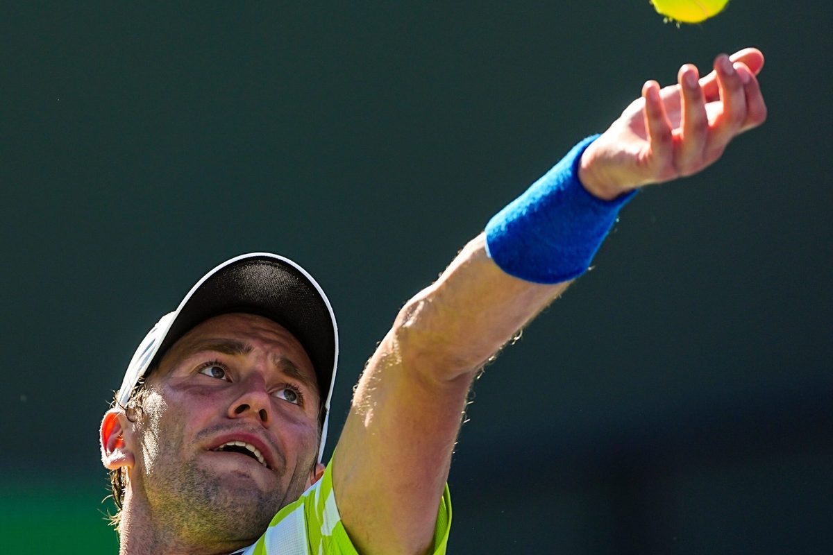 Casper Ruud readies a serve to Carlos Alcaraz during their fourth-round match at the BNP Paribas Open in Indian Wells, Calif., Wednesday, March 11, 2026.