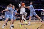 Mar 12, 2026; New York, NY, USA; Seton Hall Pirates guard Jacob Dar (1) grabs a rebound against Creighton Bluejays guard Josh Dix (4) and forward Jasen Green (0) and guard Fedor Zugic (7) during the second half at Madison Square Garden. Mandatory Credit: Brad Penner-Imagn Images