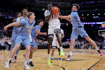 Mar 12, 2026; New York, NY, USA; Seton Hall Pirates guard Jacob Dar (1) grabs a rebound against Creighton Bluejays guard Josh Dix (4) and forward Jasen Green (0) and guard Fedor Zugic (7) during the second half at Madison Square Garden. Mandatory Credit: Brad Penner-Imagn Images