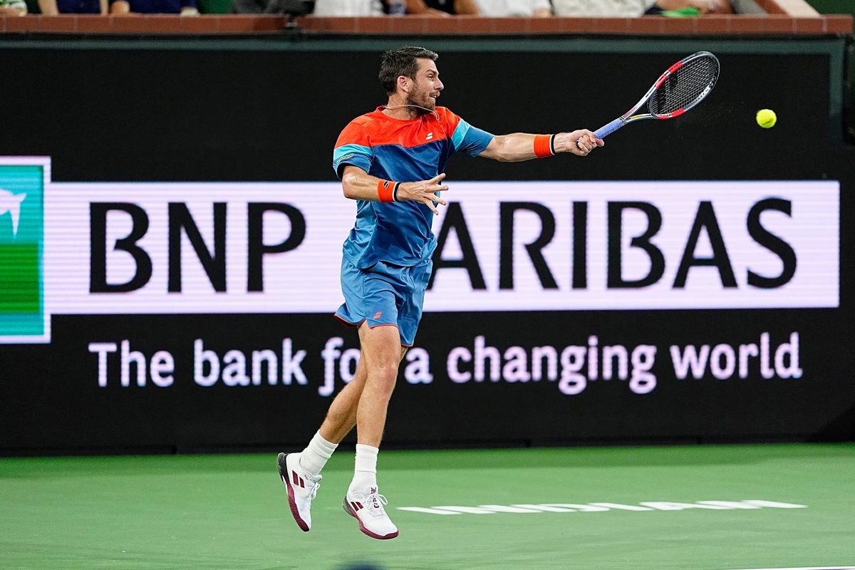 Cameron Norrie returns to Carlos Alcaraz during their BNP Paribas Open quarterfinal match on Stadium 1 at the Indian Wells Tennis Garden in Indian Wells, Calif., on Thursday, March 12, 2026.