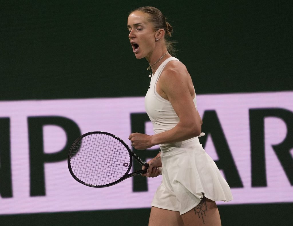 Elina Svitolina reacts to winning a point to extend her match against Elena Rybakina in the women’s semifinal at the BNP Paribas Open at the Indian Wells Tennis Garden in Indian Wells, Calif., March 13, 2026.