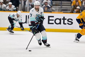 Mar 19, 2026; Nashville, Tennessee, USA;  Seattle Kraken right wing Jordan Eberle (7) skates with the puck against the Nashville Predators during the second period at Bridgestone Arena. Mandatory Credit: Steve Roberts-Imagn Images