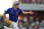 Mar 20, 2026; Mesa, Arizona, USA; Chicago Cubs pitcher Matthew Boyd (16) flips the ball for an out against the Cincinnati Reds in the second inning at Sloan Park. Mandatory Credit: Rick Scuteri-Imagn Images