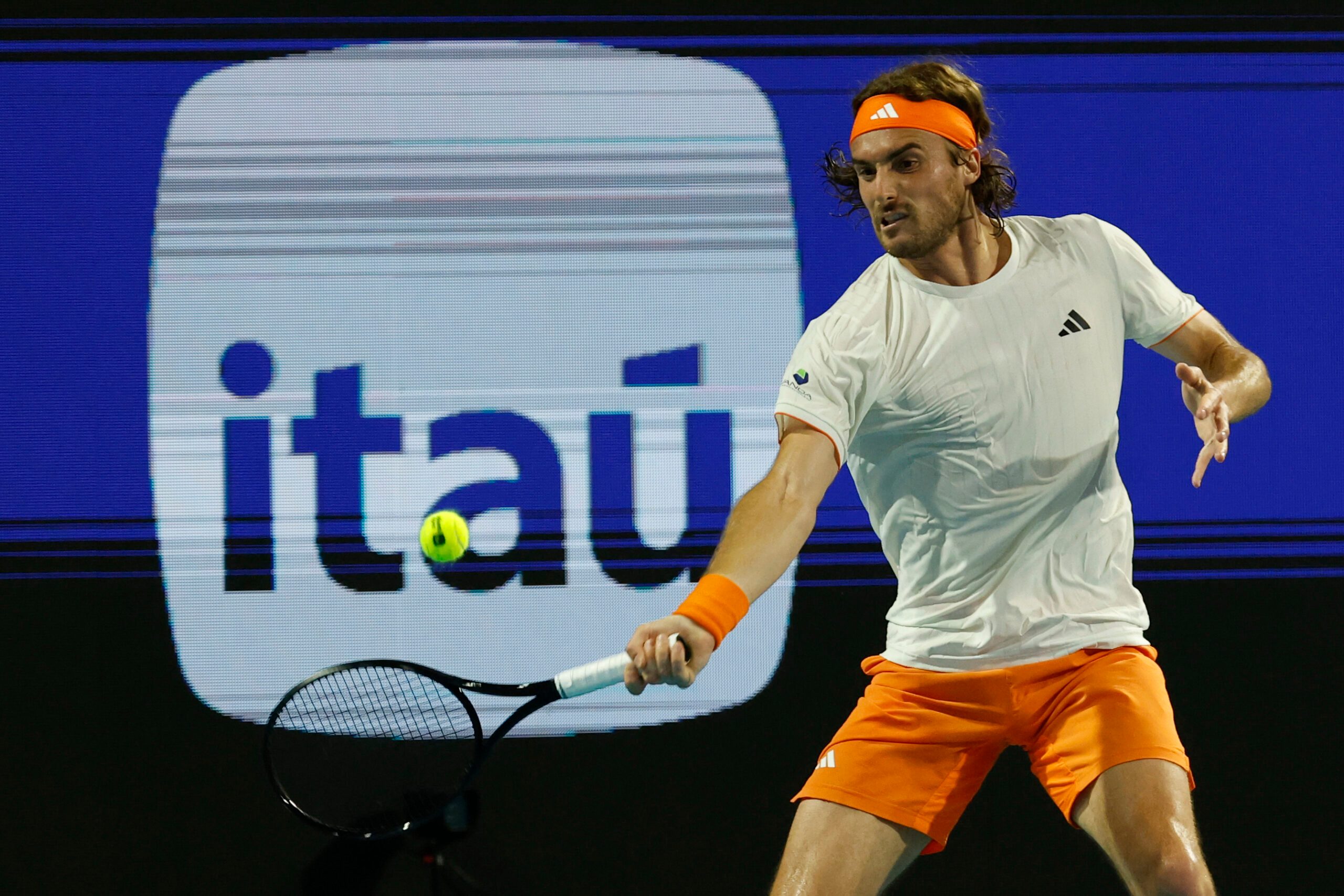 Mar 22, 2026; Miami Gardens, FL, USA; Stefanos Tsitsipas (GRE) hits a forehand against Arthur Fils (FRA) (not pictured) on day six of the 2026 Miami Open at Hard Rock Stadium. Mandatory Credit: Geoff Burke-Imagn Images