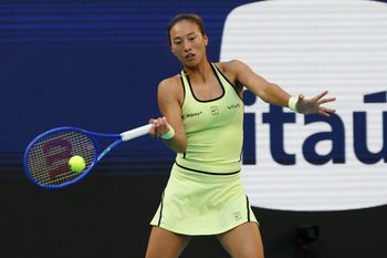 Mar 23, 2026; Miami Gardens, FL, USA; Qinwen Zheng (CHN) hits a forehand against Aryna Sabalenka (not pictured) on day 7 of the 2026 Miami Open at Hard Rock Stadium. Mandatory Credit: Geoff Burke-Imagn Images