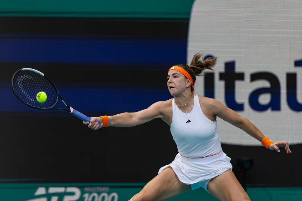 Mar 26, 2026; Miami Gardens, FL, USA; Karolina Muchova of the Czech Republic hits a shot against Coco Gauff of the United States in the semi-finals of the women’s singles at the Miami Open at the Hard Rock Stadium. Mandatory Credit: Mike Frey-Imagn Images
