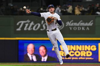 Mar 29, 2026; Milwaukee, Wisconsin, USA; Milwaukee Brewers second baseman Brice Turang (2) throws out Chicago White Sox left fielder Austin Hays in the seventh inning at American Family Field. Mandatory Credit: Benny Sieu-Imagn Images