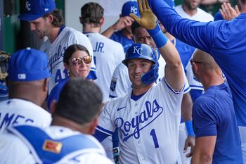 Mar 30, 2026; Kansas City, Missouri, USA; Kansas City Royals left fielder Isaac Collins (1) celebrates in the dugout after hitting a solo home run against the Minnesota Twins in the seventh inning at Kauffman Stadium. Mandatory Credit: Denny Medley-Imagn Images