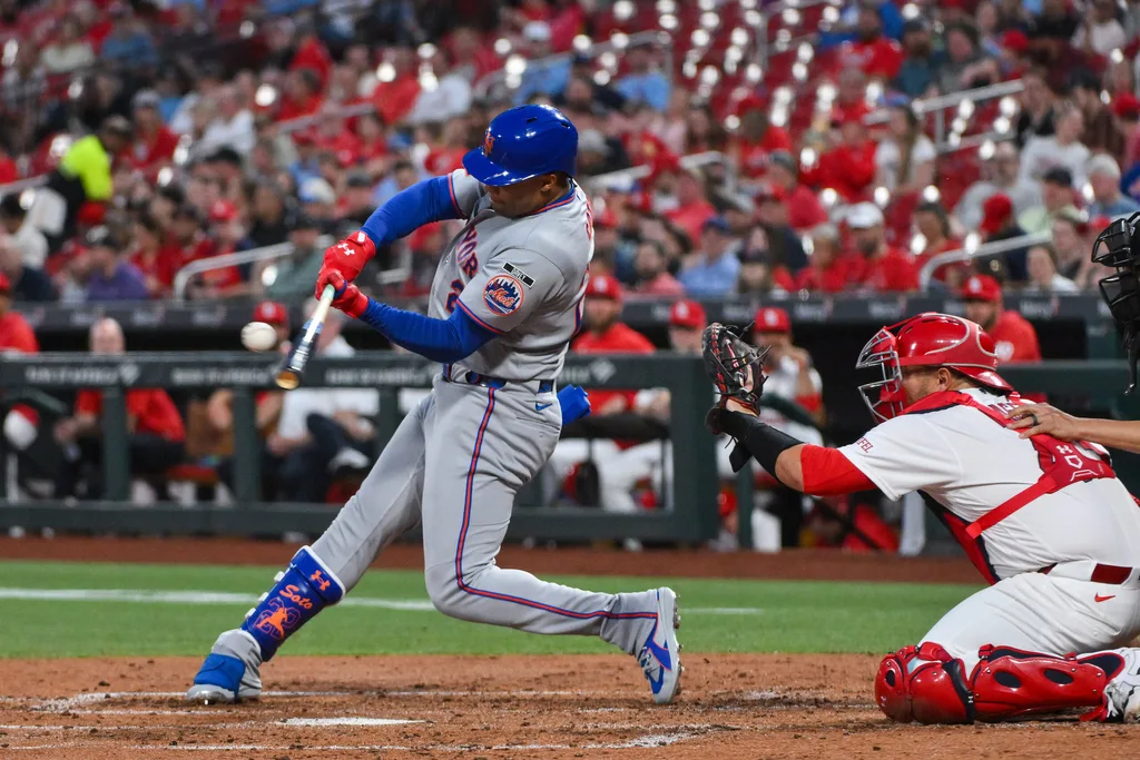 Mar 30, 2026; St. Louis, Missouri, USA; New York Mets left fielder Juan Soto (22) hits a single against the St. Louis Cardinals during the third inning at Busch Stadium. Mandatory Credit: Jeff Curry-Imagn Images