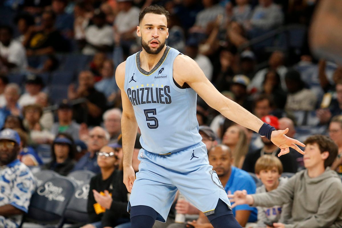 Mar 30, 2026; Memphis, Tennessee, USA; Memphis Grizzlies forward Tyler Burton (5) reacts during the third quarter against the Phoenix Suns at FedExForum. Mandatory Credit: Petre Thomas-Imagn Images