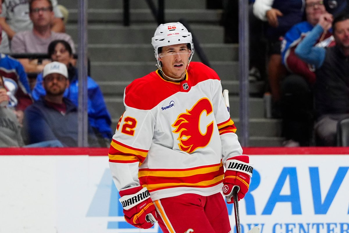 Mar 30, 2026; Denver, Colorado, USA; Calgary Flames center Ryan Strome (22) celebrates a goal in the third period against the Colorado Avalanche at Ball Arena. Mandatory Credit: Ron Chenoy-Imagn Images