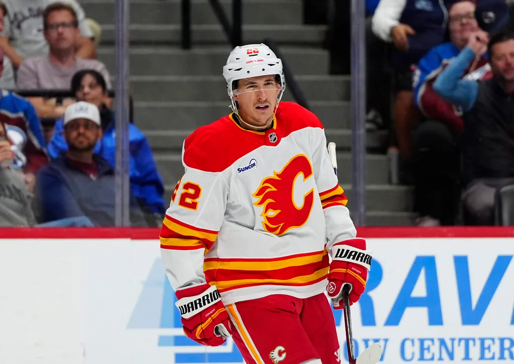 Mar 30, 2026; Denver, Colorado, USA; Calgary Flames center Ryan Strome (22) celebrates a goal in the third period against the Colorado Avalanche at Ball Arena. Mandatory Credit: Ron Chenoy-Imagn Images