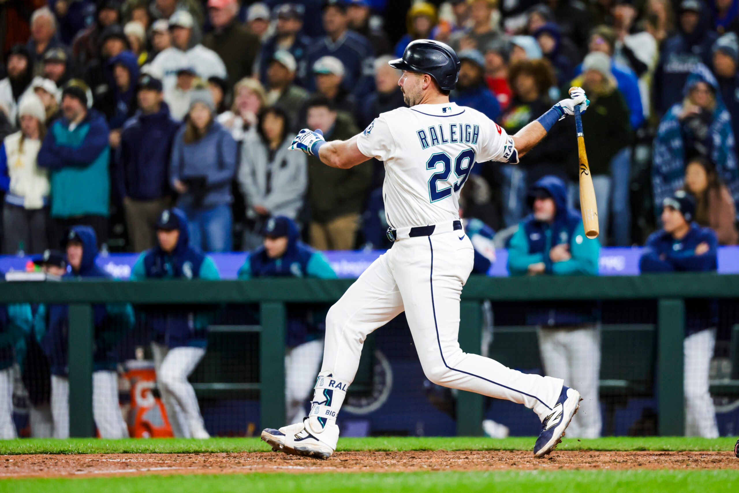 Mar 30, 2026; Seattle, Washington, USA; Seattle Mariners catcher Cal Raleigh (29) hits a walk-off RBI-single against the New York Yankees during the ninth inning at T-Mobile Park. Mandatory Credit: Joe Nicholson-Imagn Images