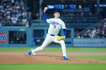 Mar 30, 2026; Los Angeles, California, USA; Los Angeles Dodgers pitcher Roki Sasaki (11) throws against the Cleveland Guardians at Dodger Stadium. Mandatory Credit: Kirby Lee-Imagn Images