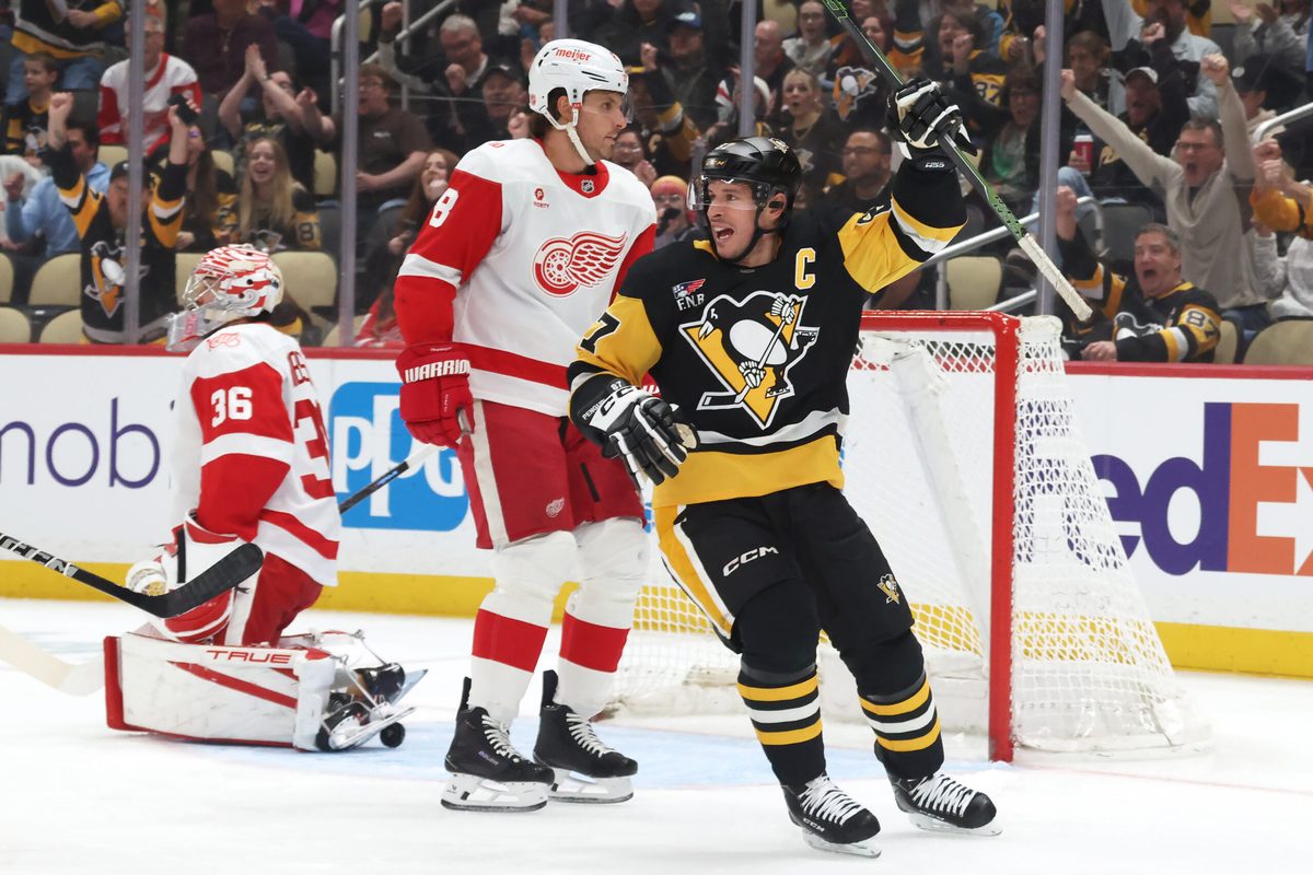 Mar 31, 2026; Pittsburgh, Pennsylvania, USA;  Pittsburgh Penguins center Sidney Crosby (87) reacts to a goal by Pittsburgh right wing Rickard Rakell (not pictured) during the first period against the Detroit Red Wings at PPG Paints Arena. Mandatory Credit: Charles LeClaire-Imagn Images