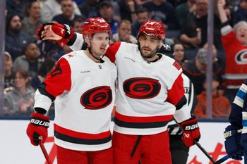 Mar 31, 2026; Columbus, Ohio, USA; Carolina Hurricanes defenseman Shayne Gostisbehere (4) celebrates his goal against the Columbus Blue Jackets during the first period at Nationwide Arena. Mandatory Credit: Russell LaBounty-Imagn Images