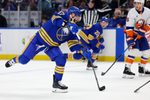 Mar 31, 2026; Buffalo, New York, USA;  Buffalo Sabres left wing Jason Zucker (17) takes a shot on goal during the second period against the New York Islanders at KeyBank Center. Mandatory Credit: Timothy T. Ludwig-Imagn Images