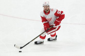 Mar 31, 2026; Pittsburgh, Pennsylvania, USA;  Detroit Red Wings right wing Alex DeBrincat (93) skates with the puck against the Pittsburgh Penguins during the third period at PPG Paints Arena. Mandatory Credit: Charles LeClaire-Imagn Images